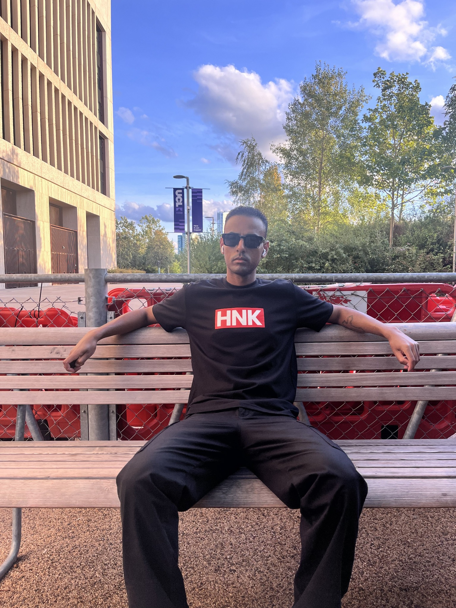 HNK Standard in black, seated view